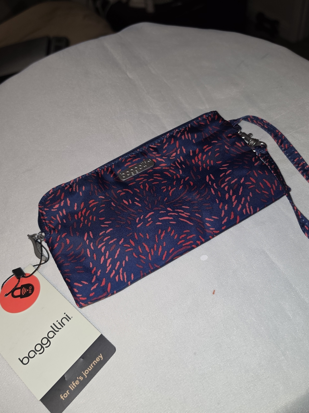 Baggallini Navy and Coral Wristlet
